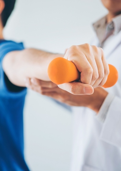 Patient performing physical therapy tasks