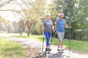 Senior couple walking outdoors for exercise 