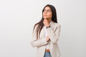 Woman wearing curious, thoughtful expression
